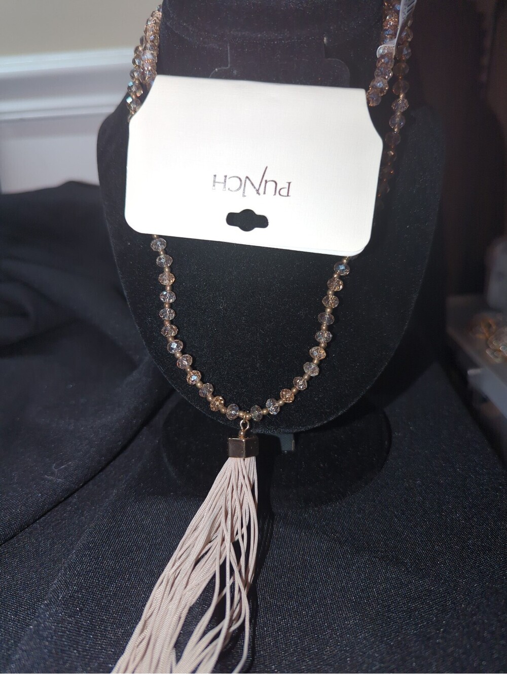 Punch Beaded Necklace with White Tassel Pendant